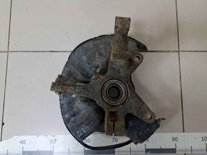 Кулак поворотный передний левый Mazda CX-7 (ER) 2006-2012