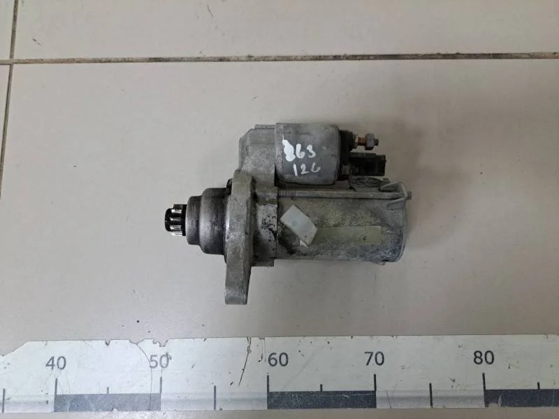 Стартер Volkswagen Passat B6 2005-2010