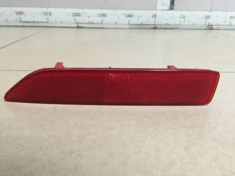 Отражатель в бампер задний левый Honda CR-V 2007-2012