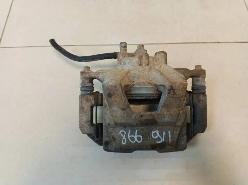 Суппорт передний правый Chevrolet Aveo T300 2011>