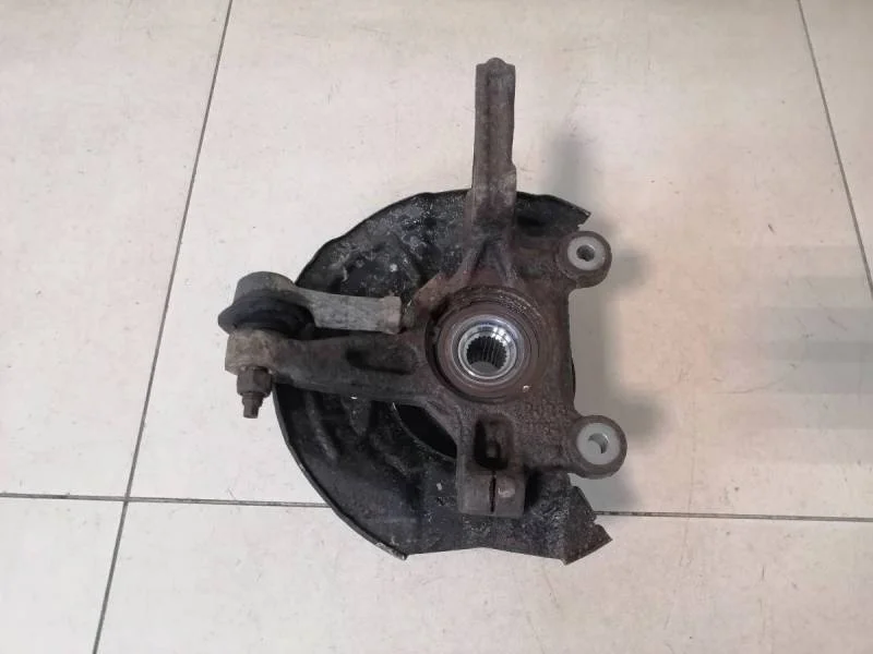 Кулак поворотный передний левый Chevrolet Aveo T300 2011>