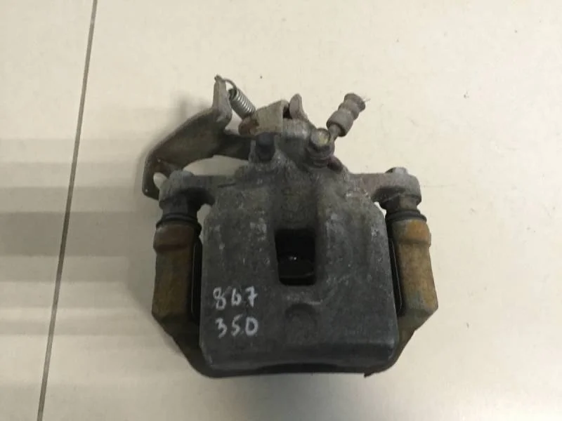 Суппорт задний левый Hyundai i30 (GD) 2012>