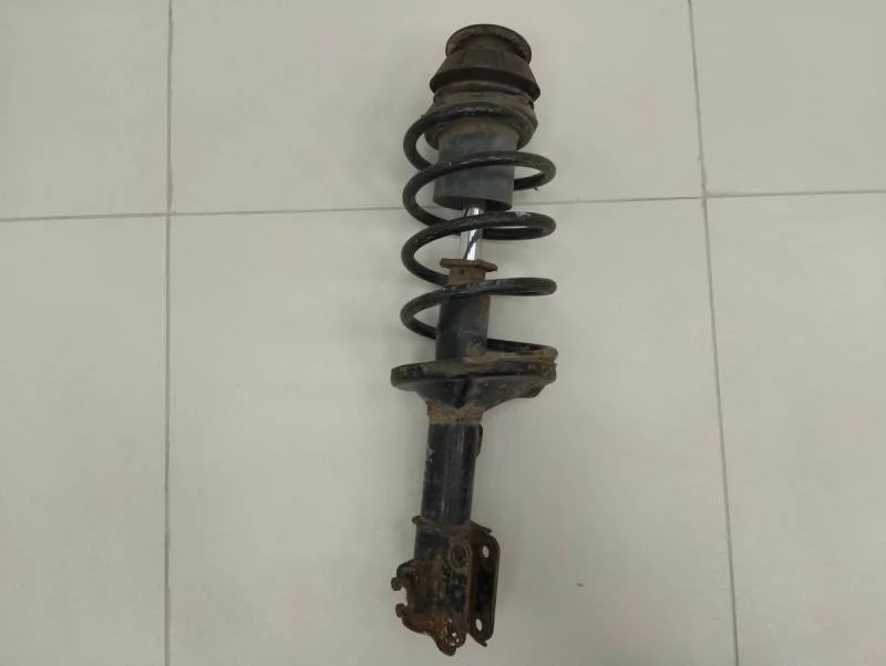 Амортизатор передний левый Chevrolet Lacetti (J200) 2003-2013