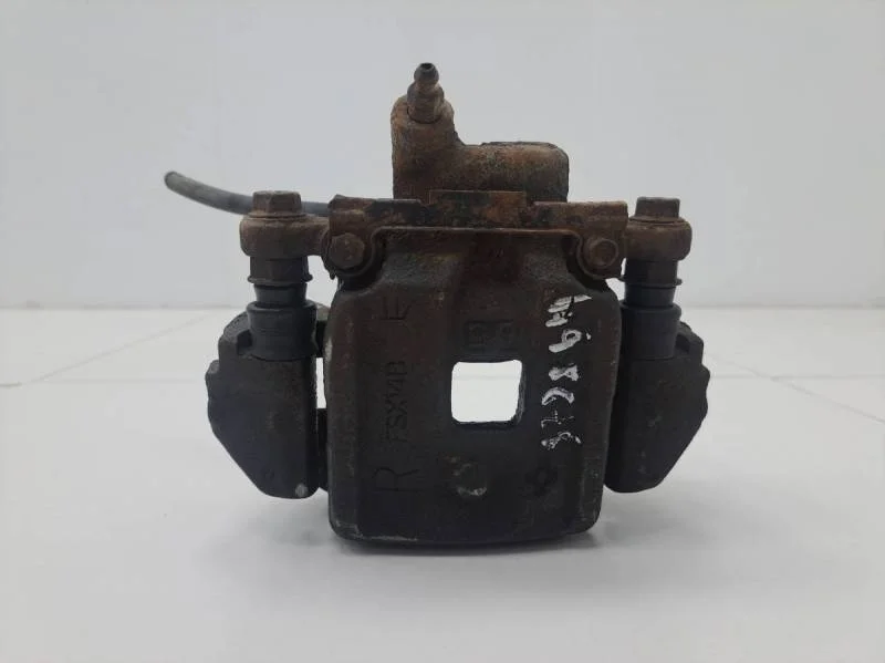 Суппорт задний правый Toyota Land Cruiser (J100) 1998-2007