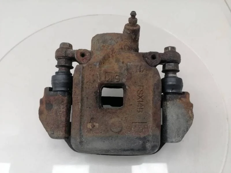 Суппорт задний левый Toyota Land Cruiser (J100) 1998-2007