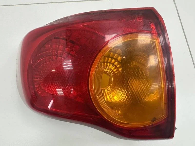 Фонарь задний наружный левый Toyota Corolla E150 2006-2013