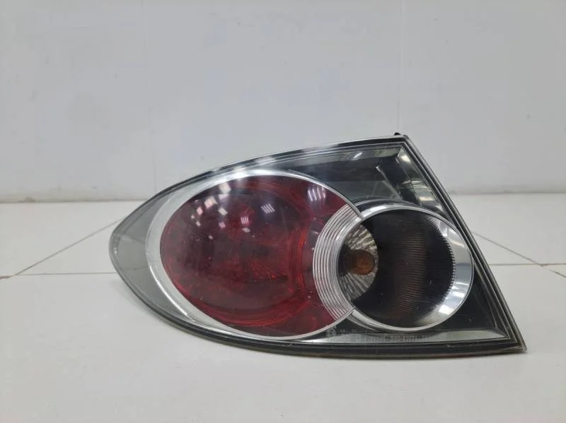 Фонарь задний наружный левый Mazda Atenza (GG) 2002-2007