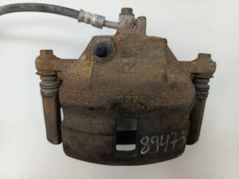 Суппорт передний правый Nissan Almera (N16) 2000-2006