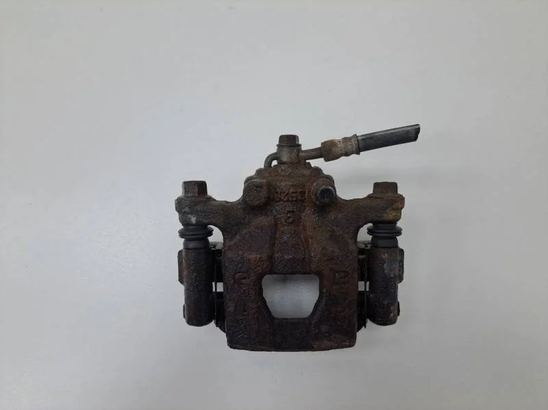 Суппорт задний правый Nissan Tiida (C11) 2007-2014