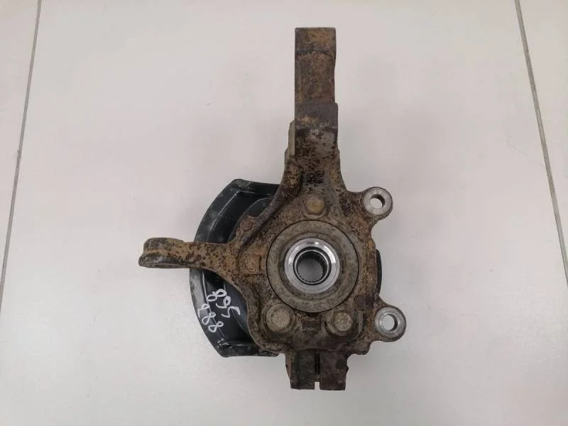 Кулак поворотный передний левый Nissan Tiida (C11) 2007-2014