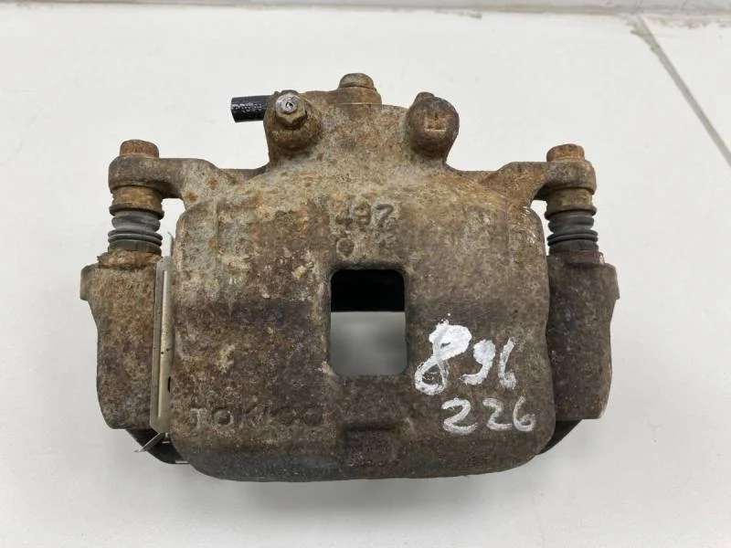 Суппорт передний левый Mitsubishi Pajero/Montero Sport (KH) 2008-2015