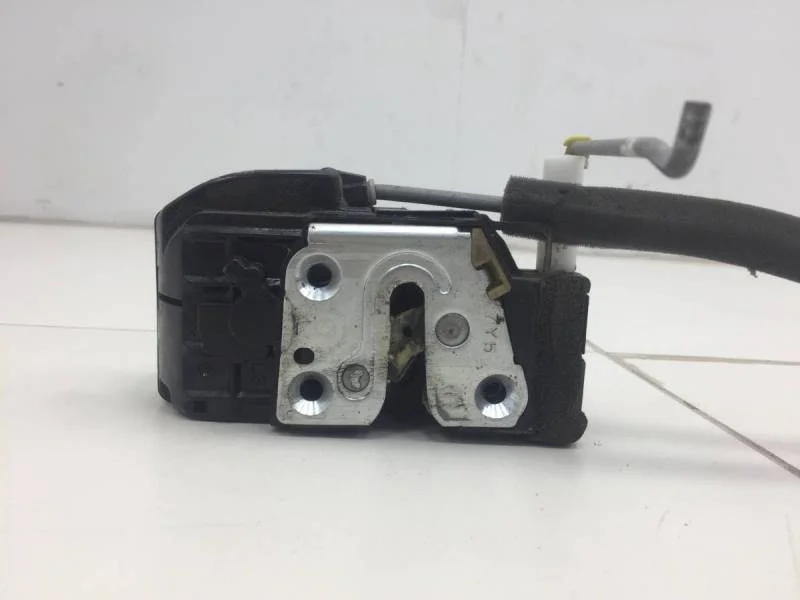 Замок двери передней левой Nissan Tiida (C11) 2007-2014