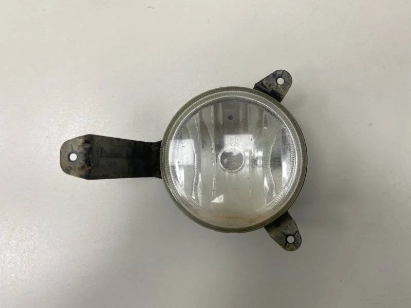 Фара противотуманная левая Mitsubishi L200 (KB) 2006-2016