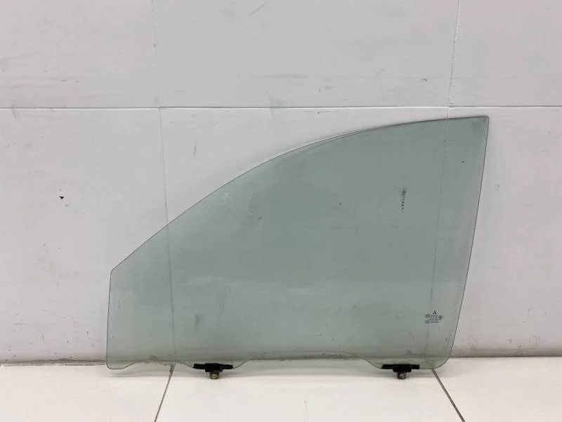 Стекло двери передней левой Mitsubishi L200 (KB) 2006-2016