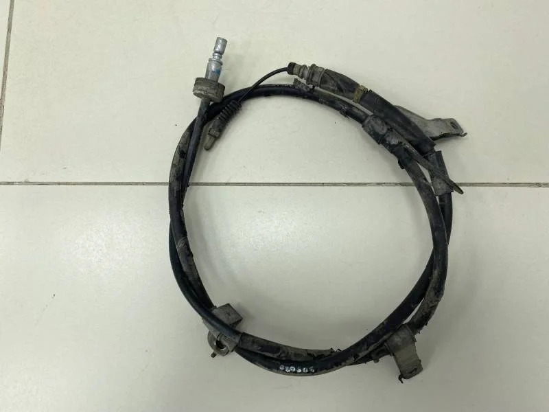 Трос стояночного тормоза левый Kia Ceed (JD) 2012-2018