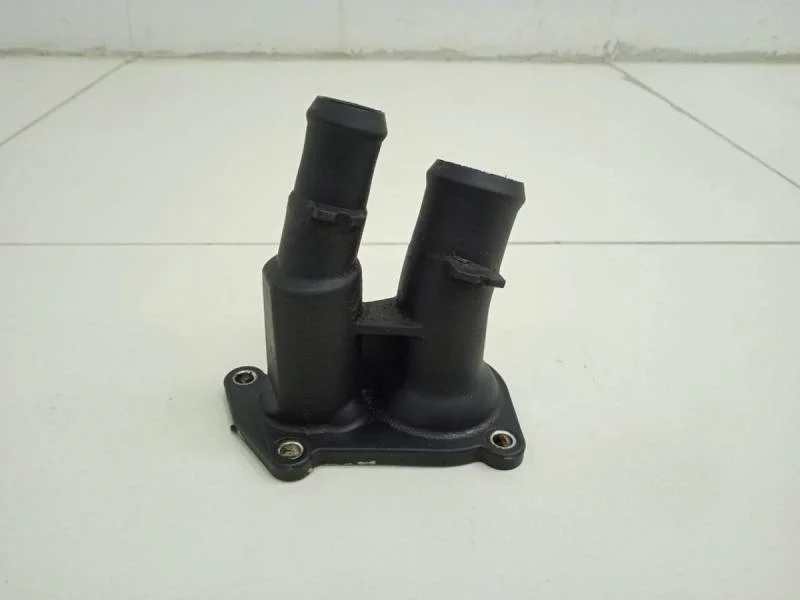 Крышка термостата Ford Fiesta (MK5) 2002-2008