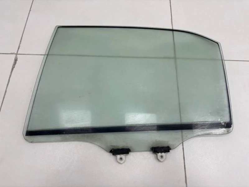 Стекло двери задней левой Mitsubishi Lancer 9  (CS/Classic) 2000-2011