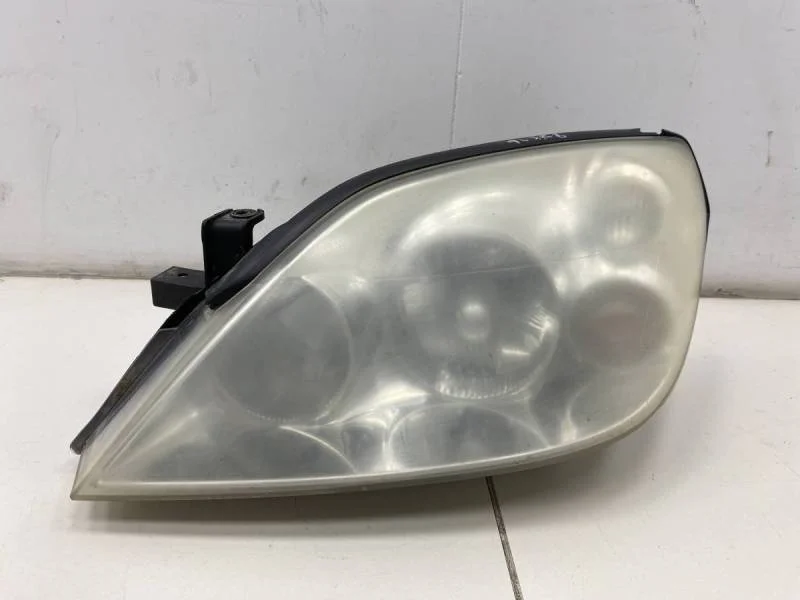 Фара левая Nissan Primera (P12) 2002-2007