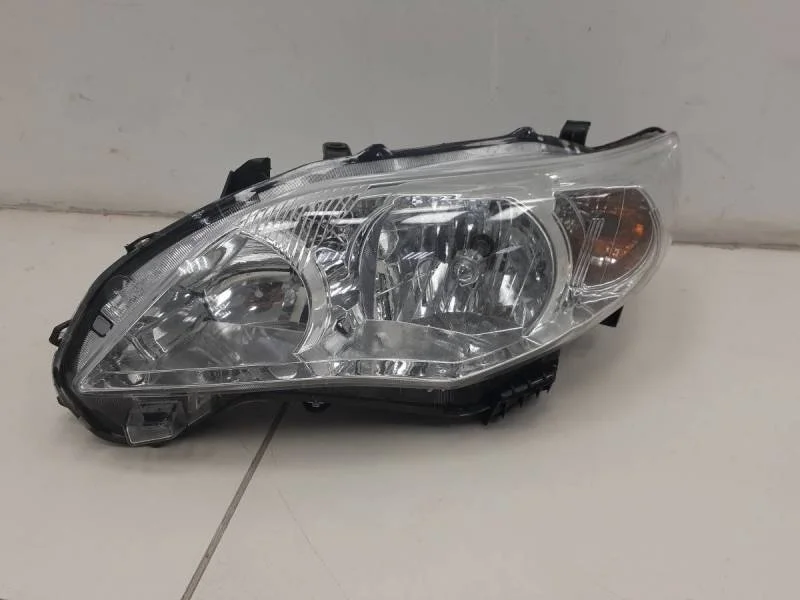 Фара левая Toyota Corolla E150 2006-2013
