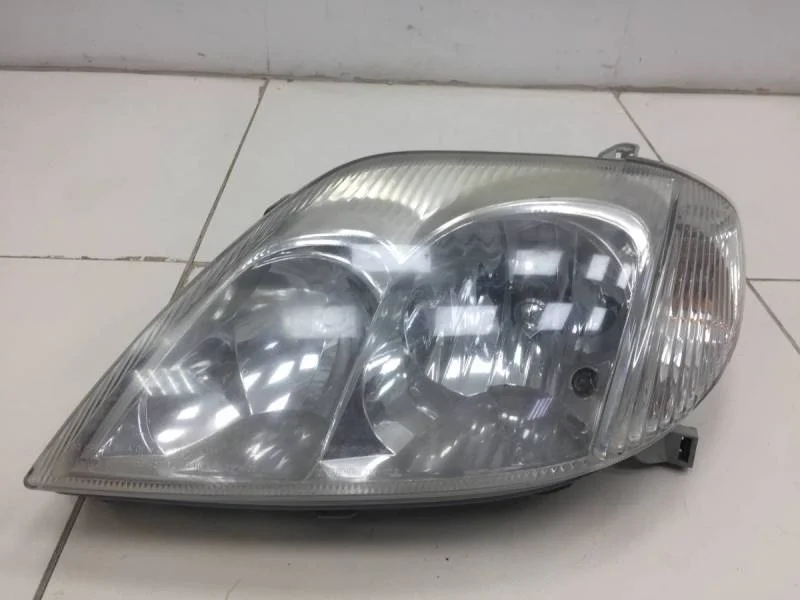 Фара левая Toyota Corolla E120 2001-2007