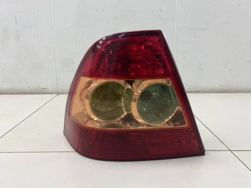 Фонарь задний левый Toyota Corolla E120 2001-2007