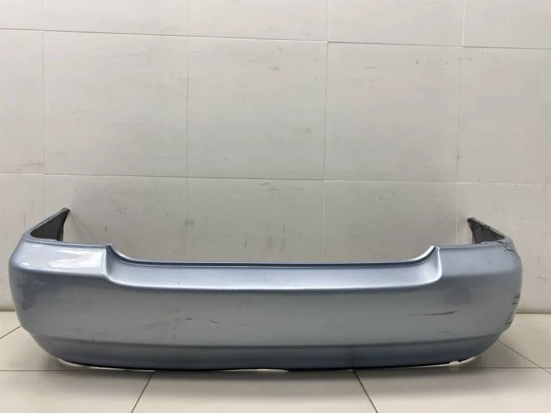 Бампер задний Toyota Corolla E120 2001-2007