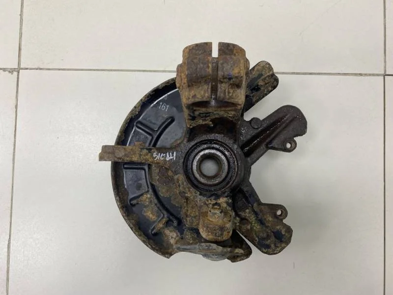 Кулак поворотный передний левый Volkswagen Polo (HB) 2009>