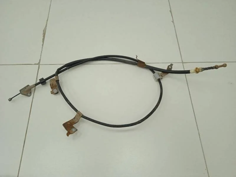 Трос стояночного тормоза левый Toyota Corolla E180 2013>