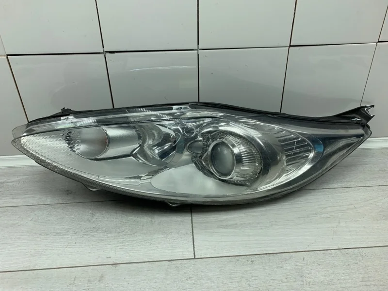 Фара галогеновая FORD FIESTA 2010 1740028 ХЭТЧБЕК TZJA, передняя левая