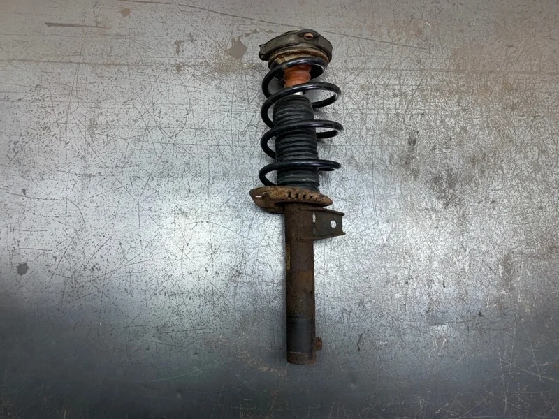 Амортизатор в сборе с пружиной Volkswagen Golf 2006 1K0413031BF ХЭТЧБЕК BLS, передний левый