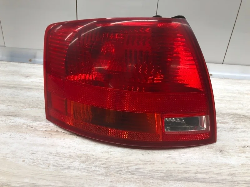 Фонарь AUDI A4 2005 8E9945095 УНИВЕРСАЛ BKE, левый