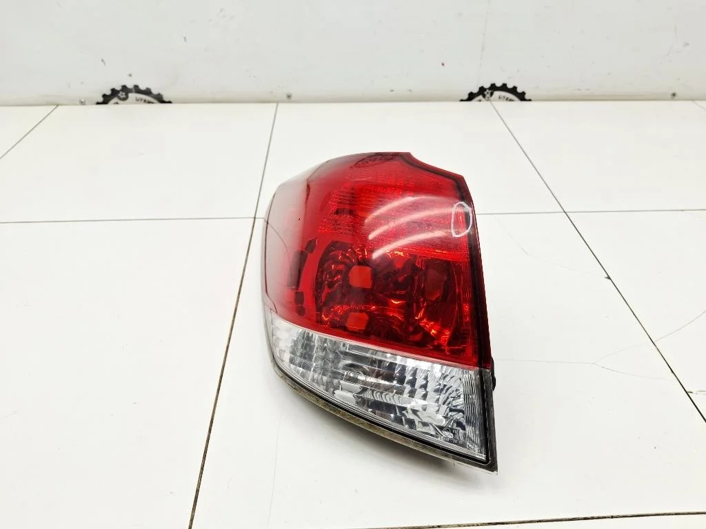 Фонарь задний наружный левый Subaru Outback B14, BR