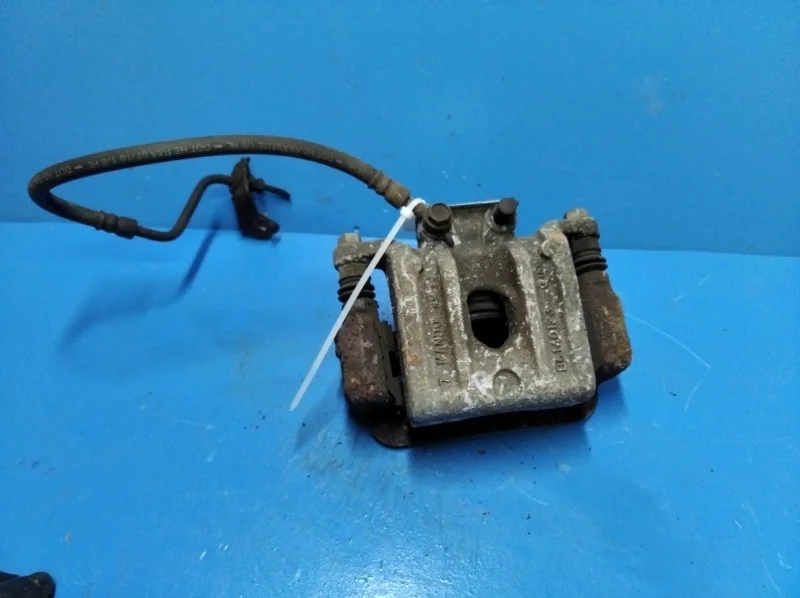 Суппорт тормозной Kia Sorento 2 2009-2012