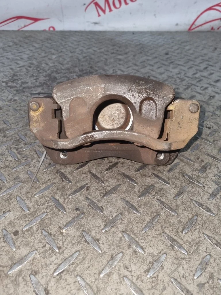 Суппорт тормозной Kia Ceed 581101H000, передний левый