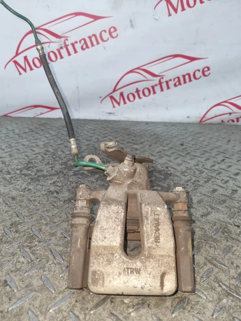 Суппорт тормозной Renault Megane 7701049108 2, задний левый