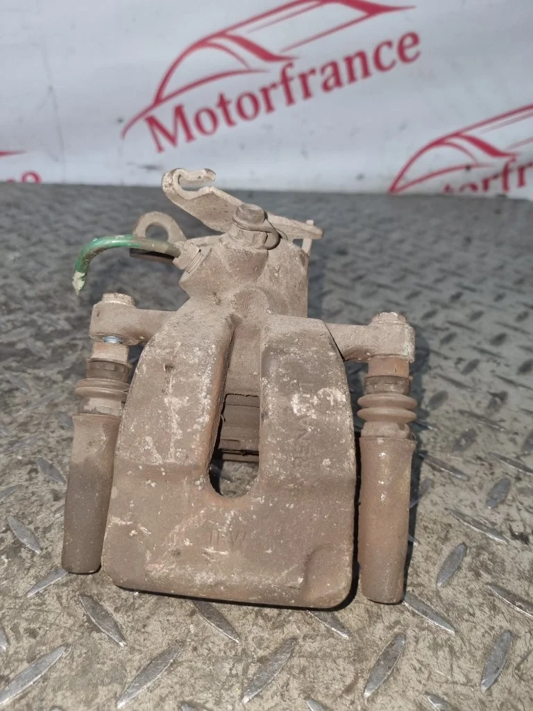 Суппорт тормозной Renault Megane 7701049108 2, задний левый