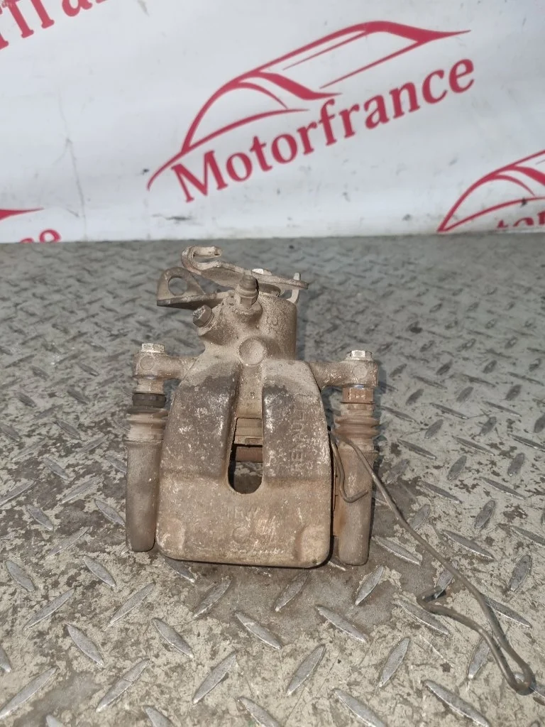 Суппорт тормозной Renault Megane 7701049108 2, задний левый