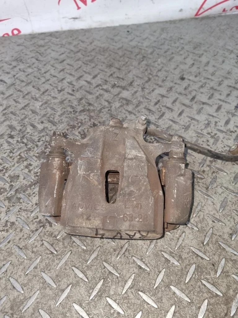 Суппорт тормозной Toyota Rav4 4775042090 XA30, передний левый