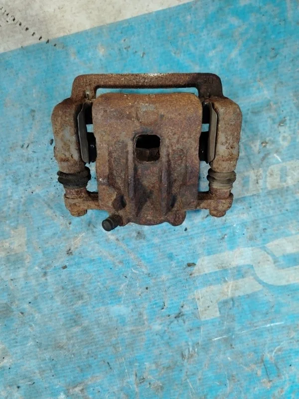 Суппорт тормозной задний левый Ssang Yong Actyon