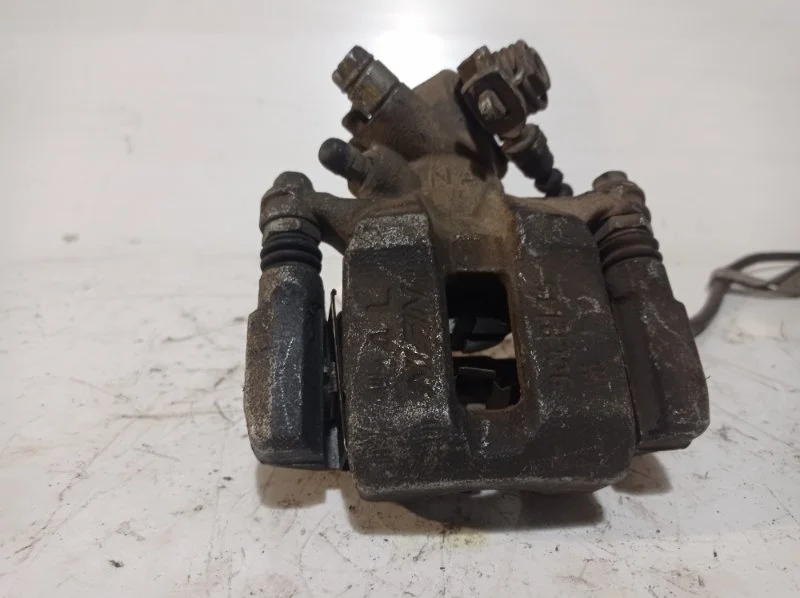 Суппорт тормозной Honda Civic 2012 43019SMGE02 4D R18A, задний левый