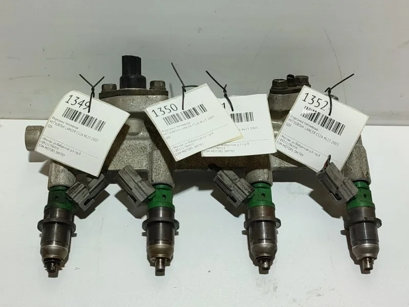 Форсунка топливная MITSUBISHI LANCER 2003 1465A014 CS2A 4G15