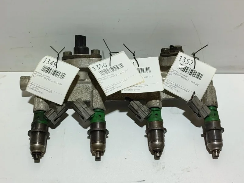 Форсунка топливная MITSUBISHI LANCER 2003 1465A014 CS2A 4G15