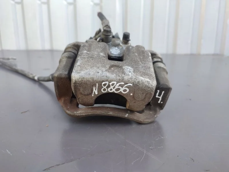 Суппорт тормозной Hyundai Elantra 58300A6300 5, задний левый