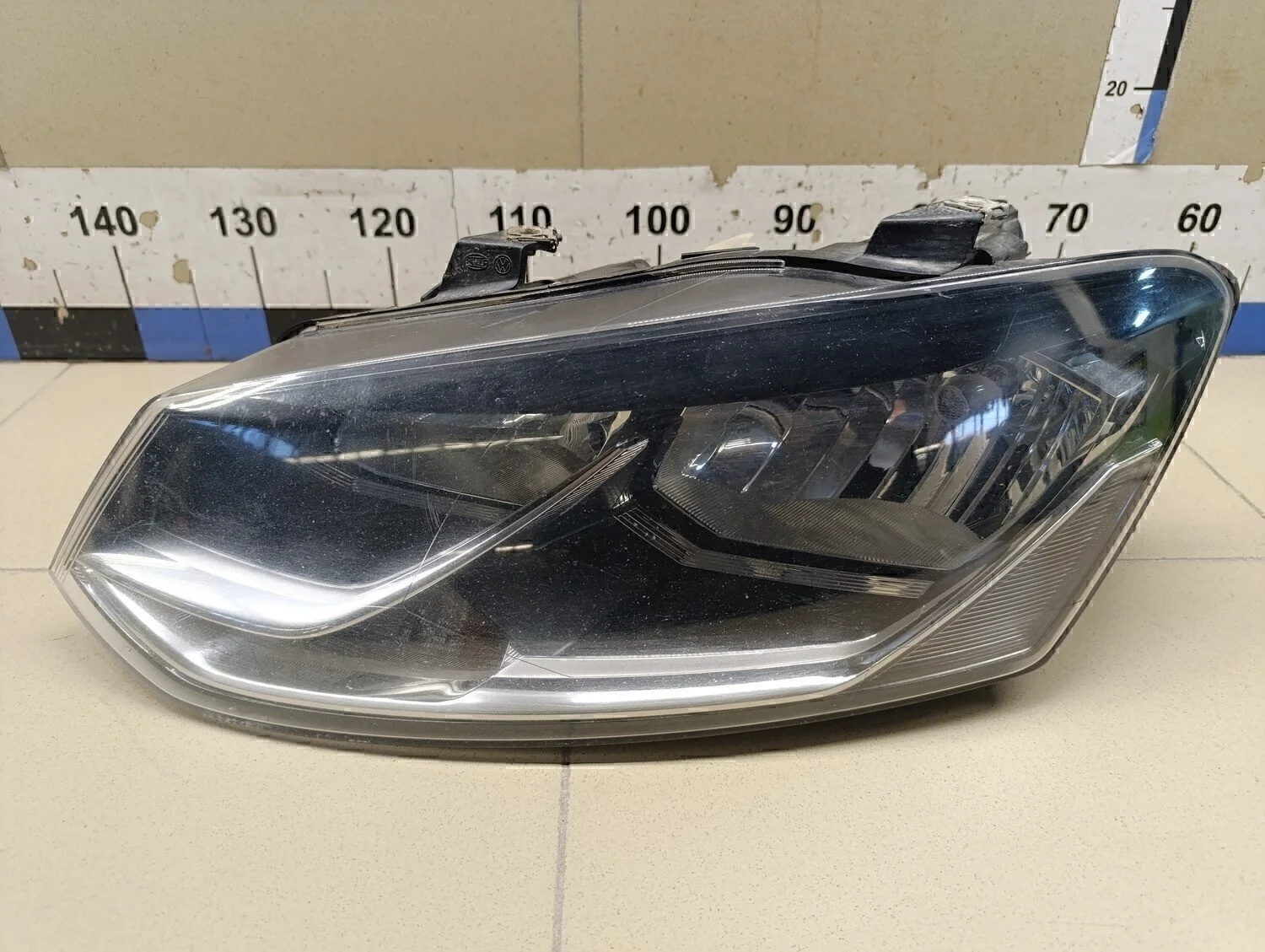 Фара левая Polo (Sed RUS) 2011>