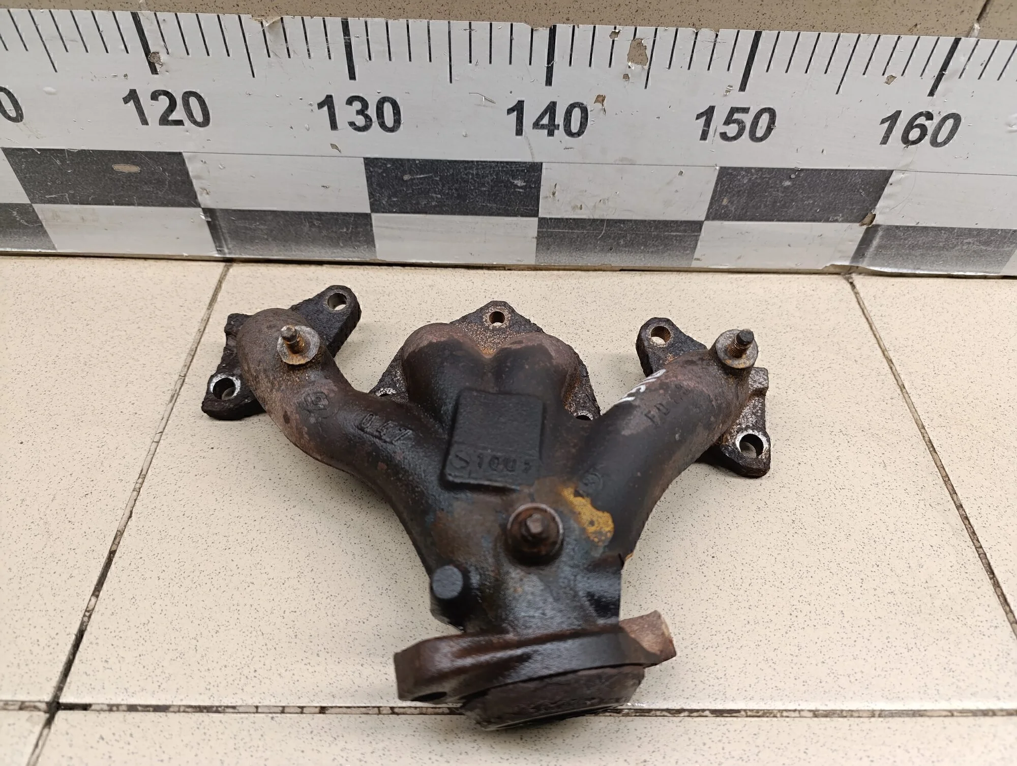 Коллектор выпускной Logan 2005-2014