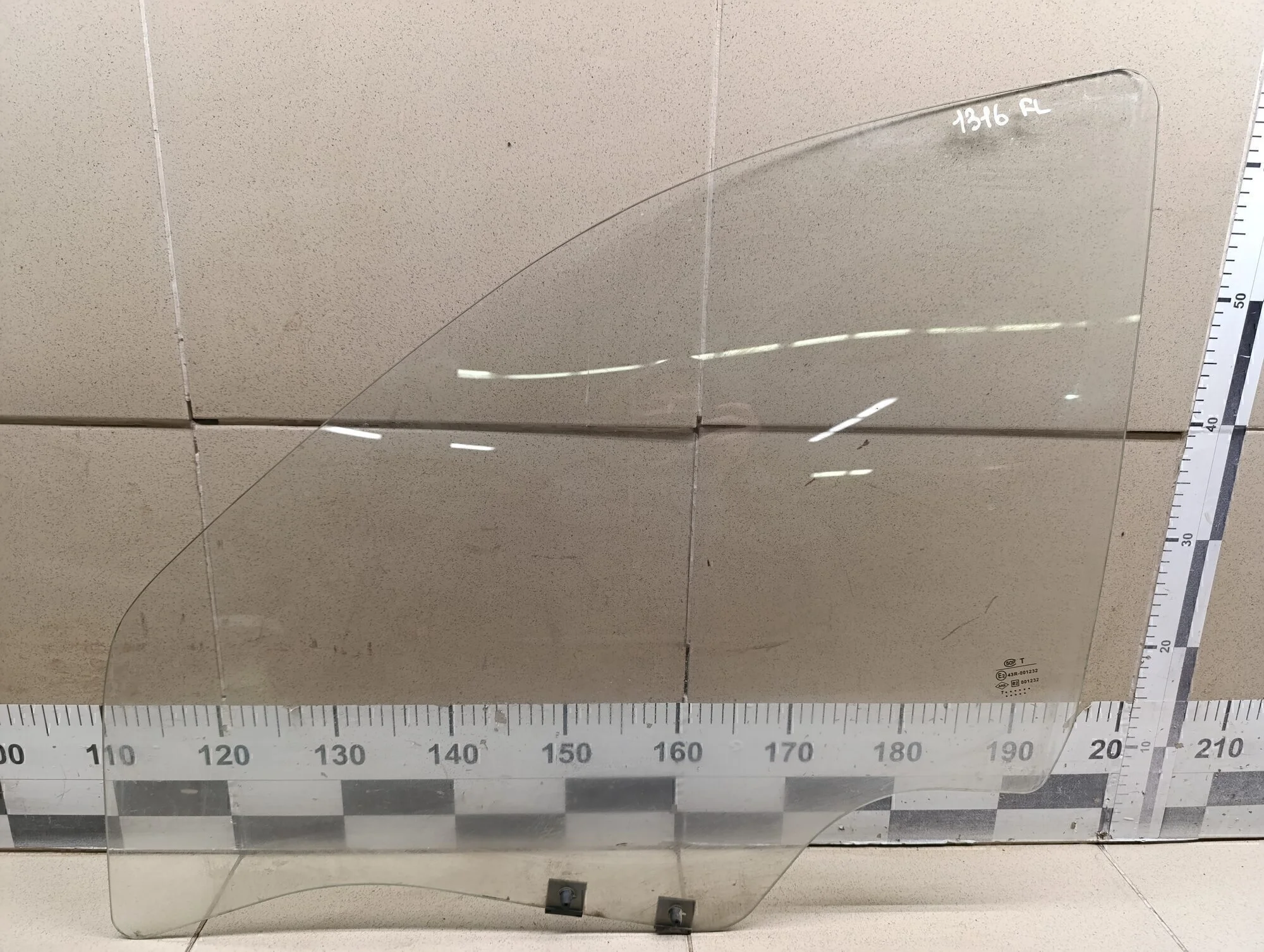 Стекло двери передней левой Logan 2005-2014