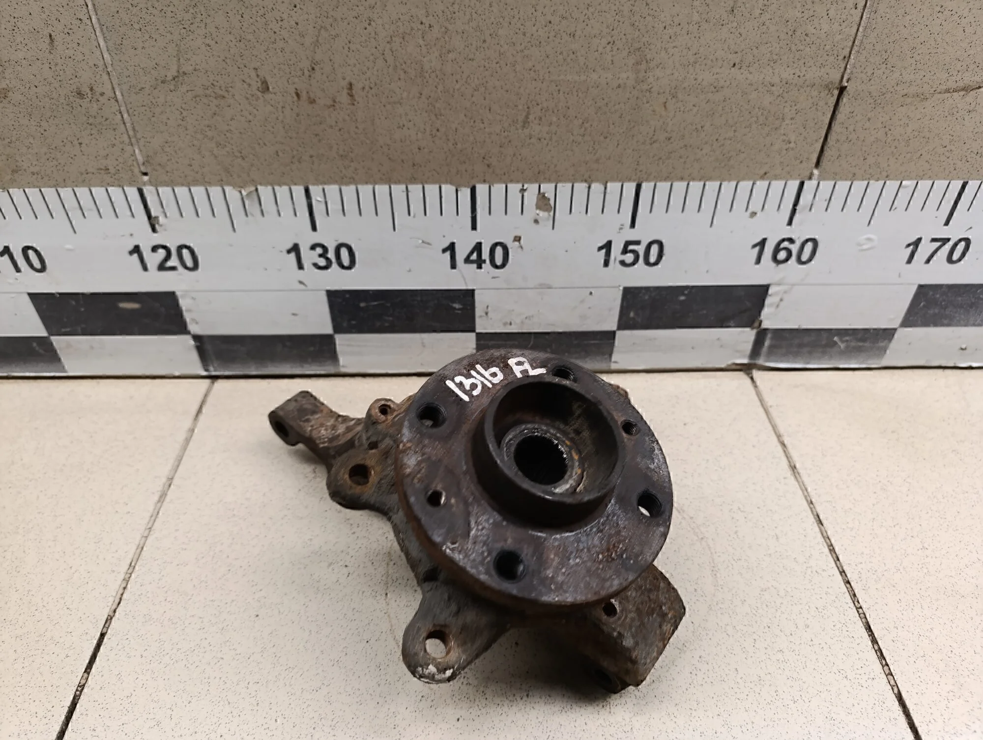 Кулак поворотный передний левый Logan 2005-2014