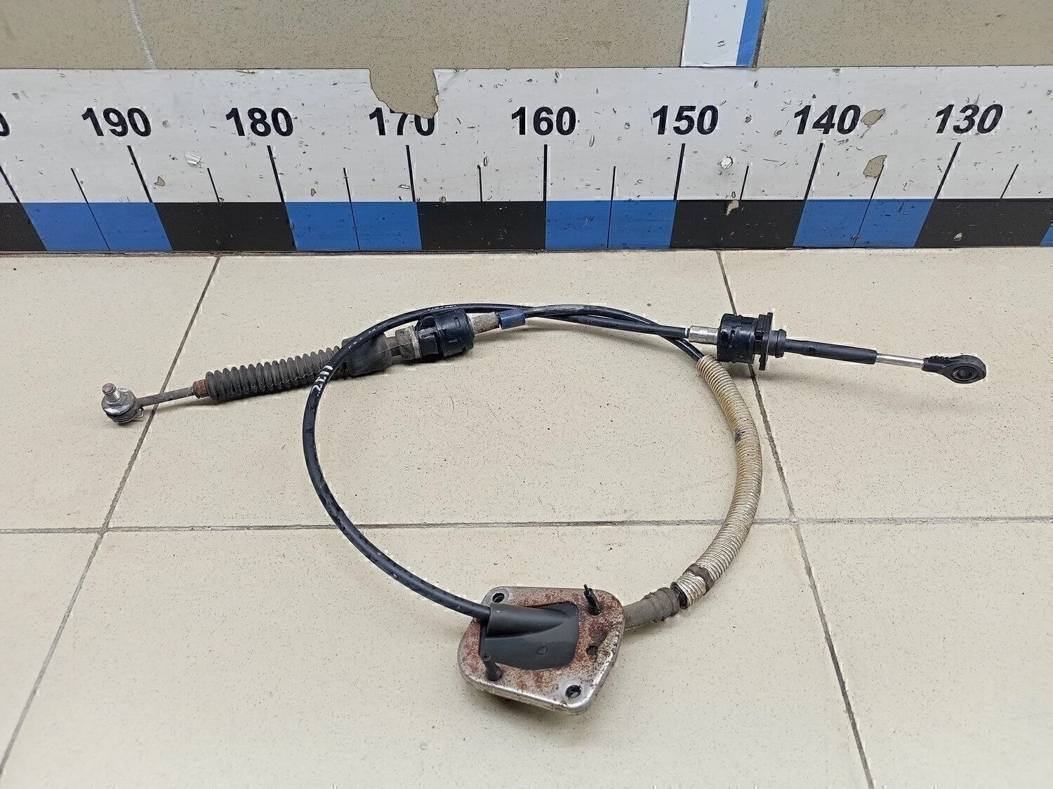 Трос КПП Outlander (GF) 2012>