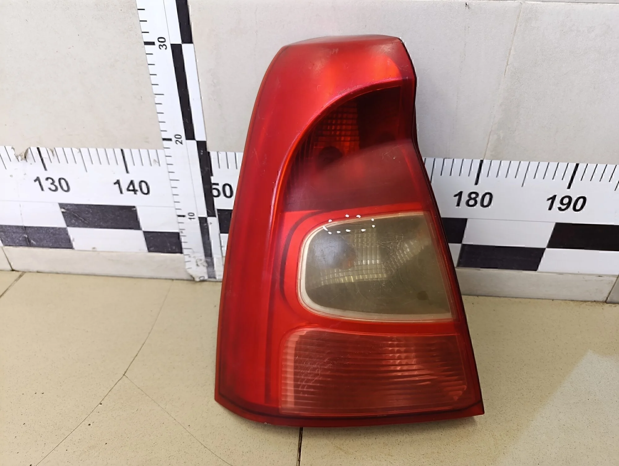 Фонарь задний левый Logan 2005-2014