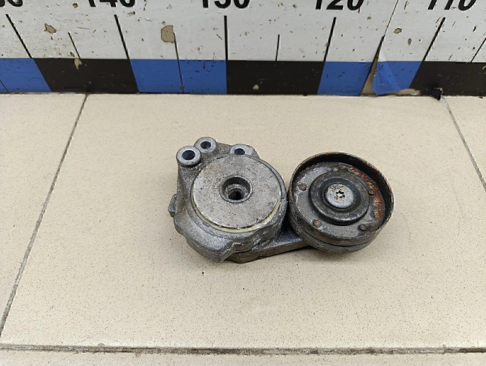 Ролик-натяжитель ручейкового ремня Passat [B6] 2005-2010